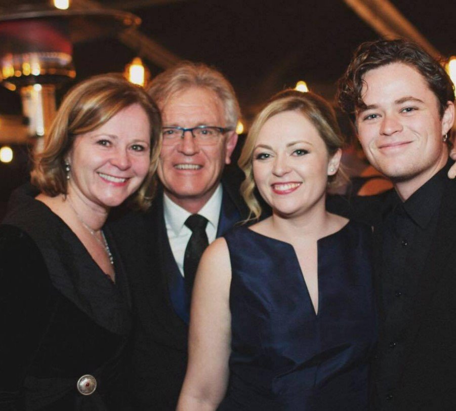 Harrison Gilbertson with his family members